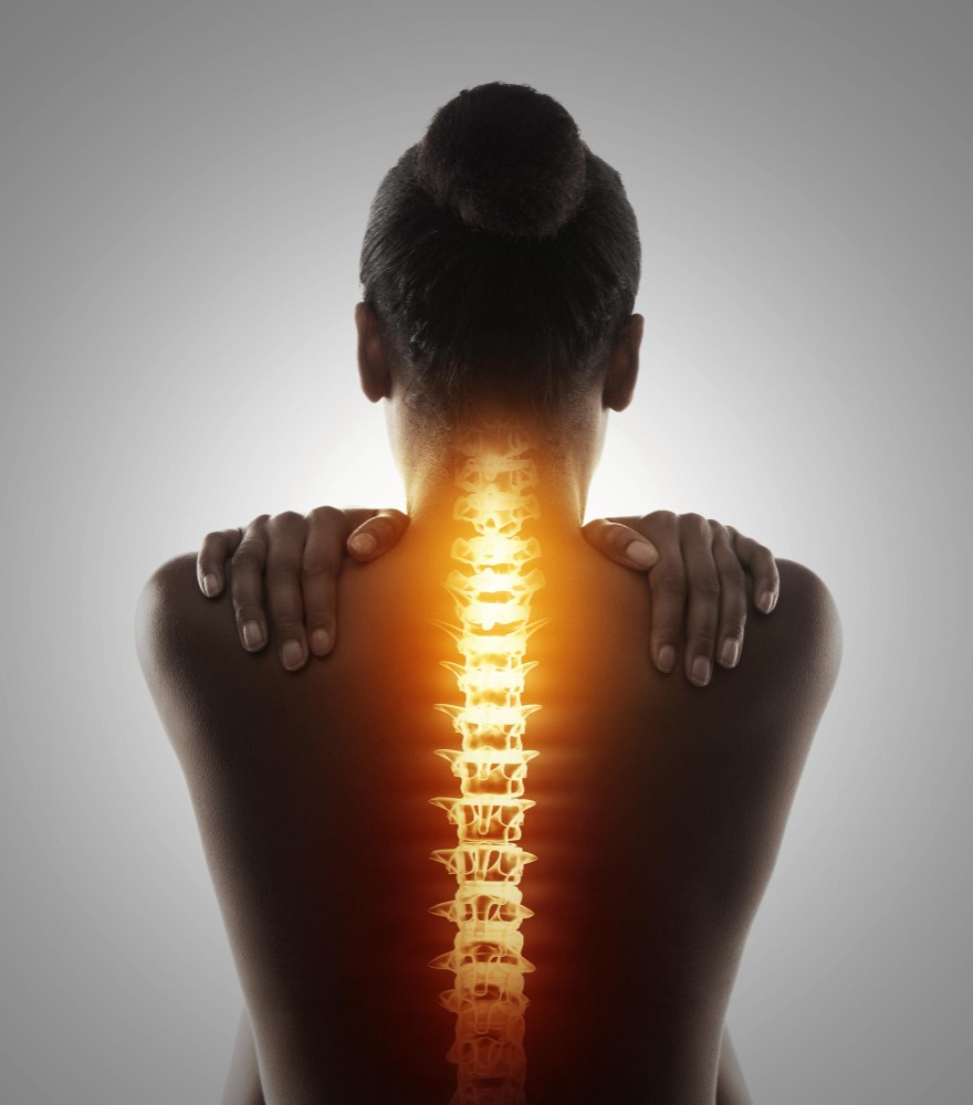 targeting-pain-rearview-shot-woman-holding-her-back-pain