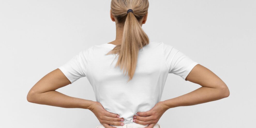 Blog woman with back pain scaled 2025